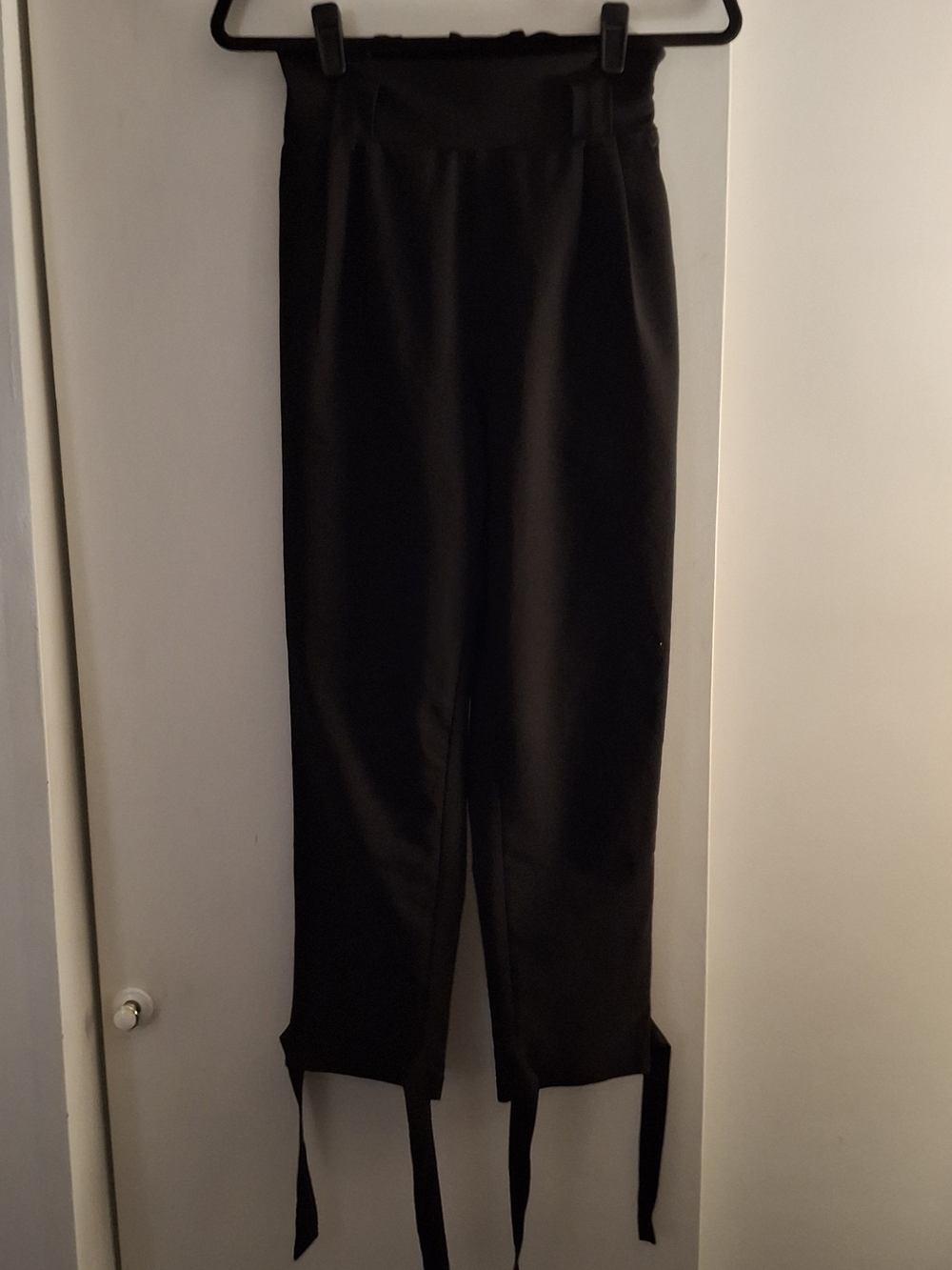 Grace Karin Woken's Black High-waist Trousers With Tie Hem